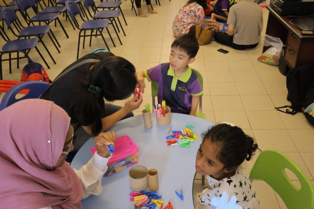 Mother playing toys with their children