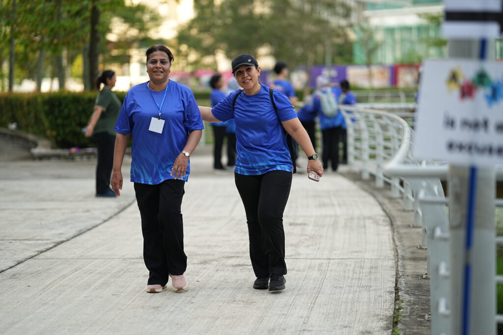 2 people walking during walk for autism
